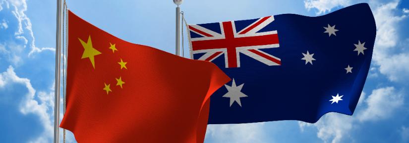 Australia and China flag against blue sky