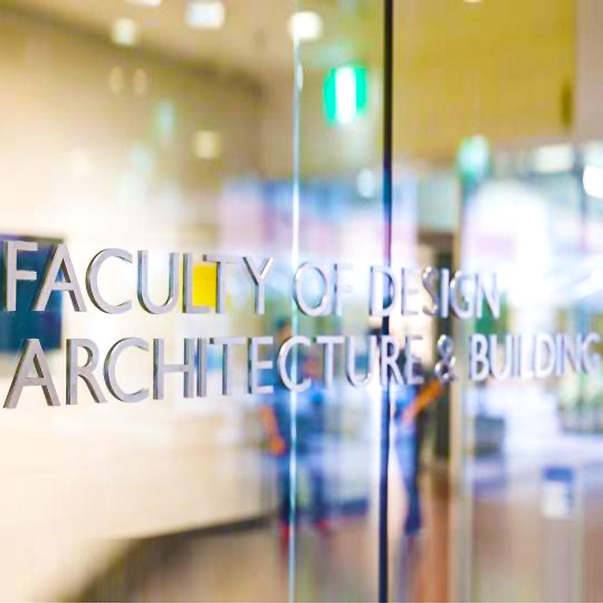 Glass door with the text Faculty of Design Architecture & Building