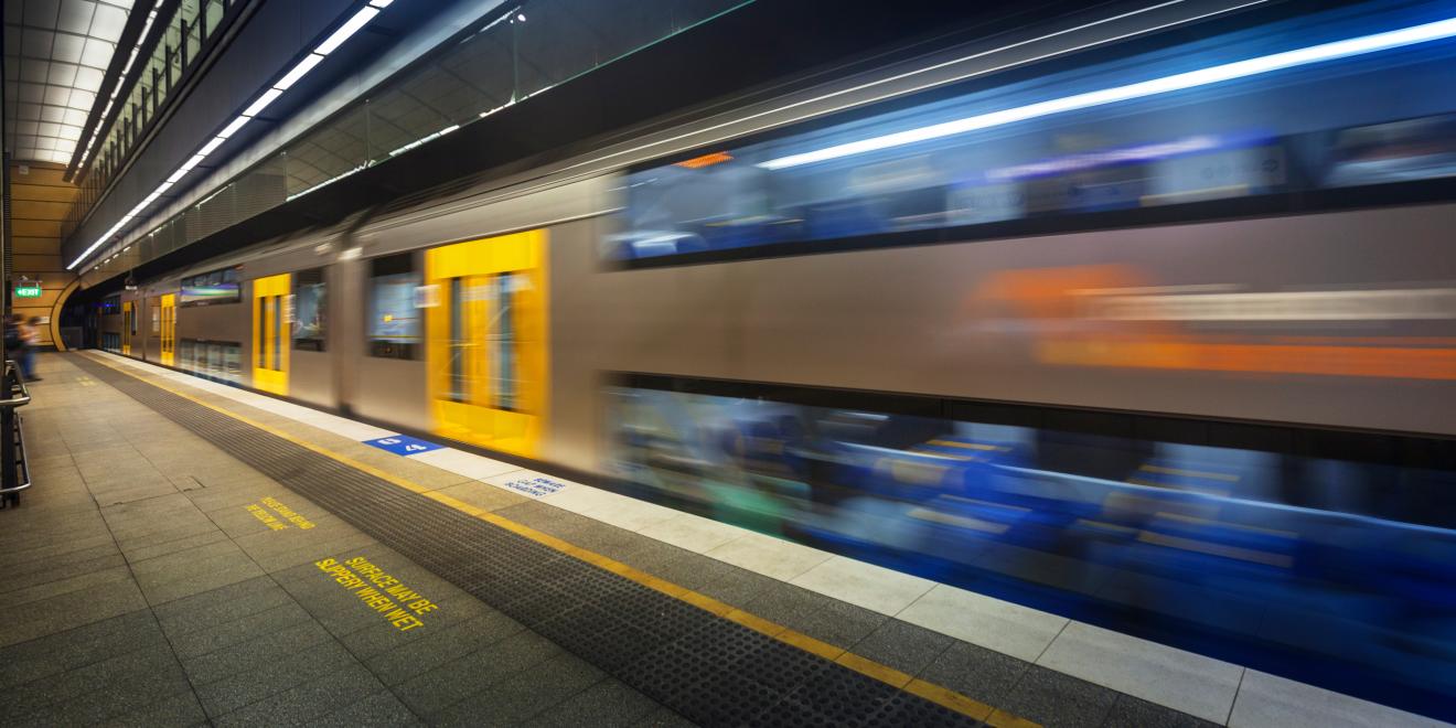 Sydney train moving through station