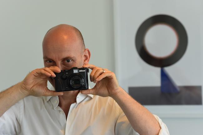 Associate Professor Marc Fischer with a camera