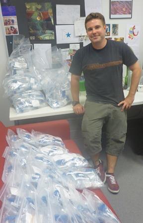 C3's Olivier Laczka with testing kits as part of project into ciguatera fish poisoning in NSW