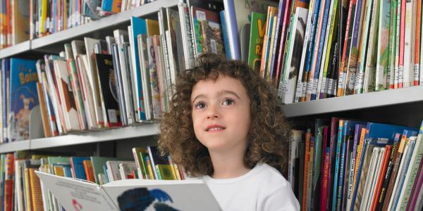 A female child student in a school library