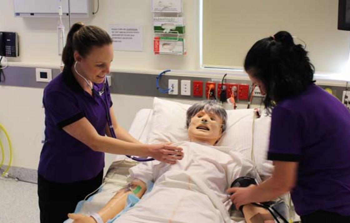 Students in a critical care simulation