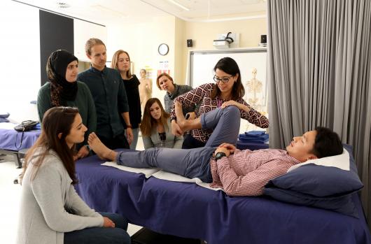 Students watch a physiotherapy demonstration