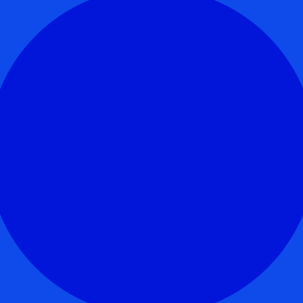 A dark blue circle sits in the centre of a lighter blue background.