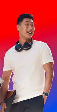 student with headphones smiling