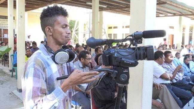 An East Timorese journalism student trains using equipment donated by University of Technology, Sydney