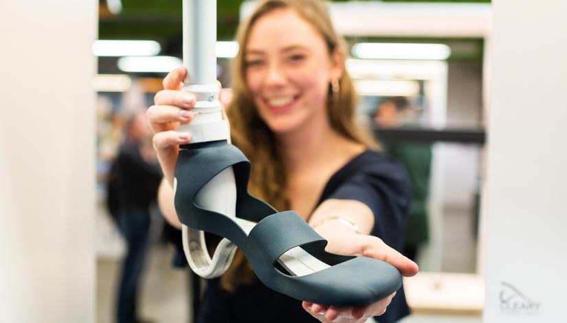 Eloise Cleary holding her prosthetic heel design
