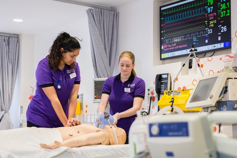 Two UTS students practicing CPR in the nursing laboratory
