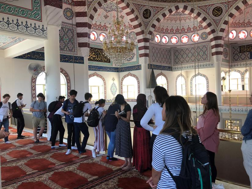 Students standing inside Gallipoli Mosque in Auburn, Sydney