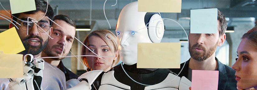 Stock image of a robot brainstorming on a clear board with a group of people