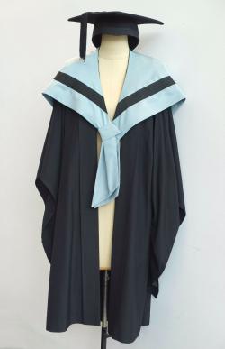 Black Bachelor gown, eau de nil grey Bachelor hood for Business and a black trencher