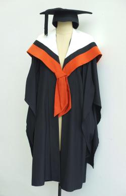 Black Bachelor gown, uluru brown Graduate Diploma hood for Communication and a black trencher