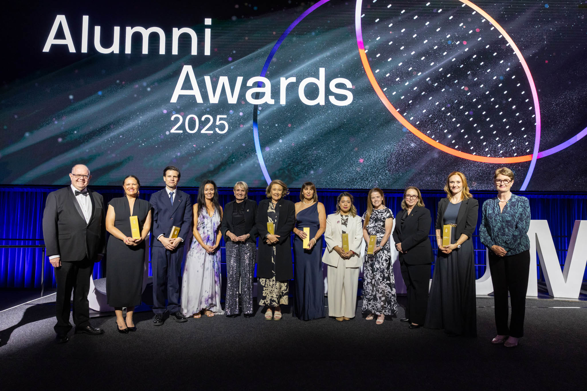 Group shot of Alumni Award winners with the Chancellor and Vice-Chancellor.