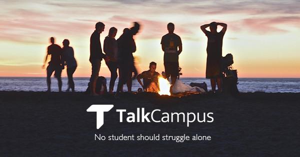 Image of students by a bonfire with the caption "No student should struggle along"