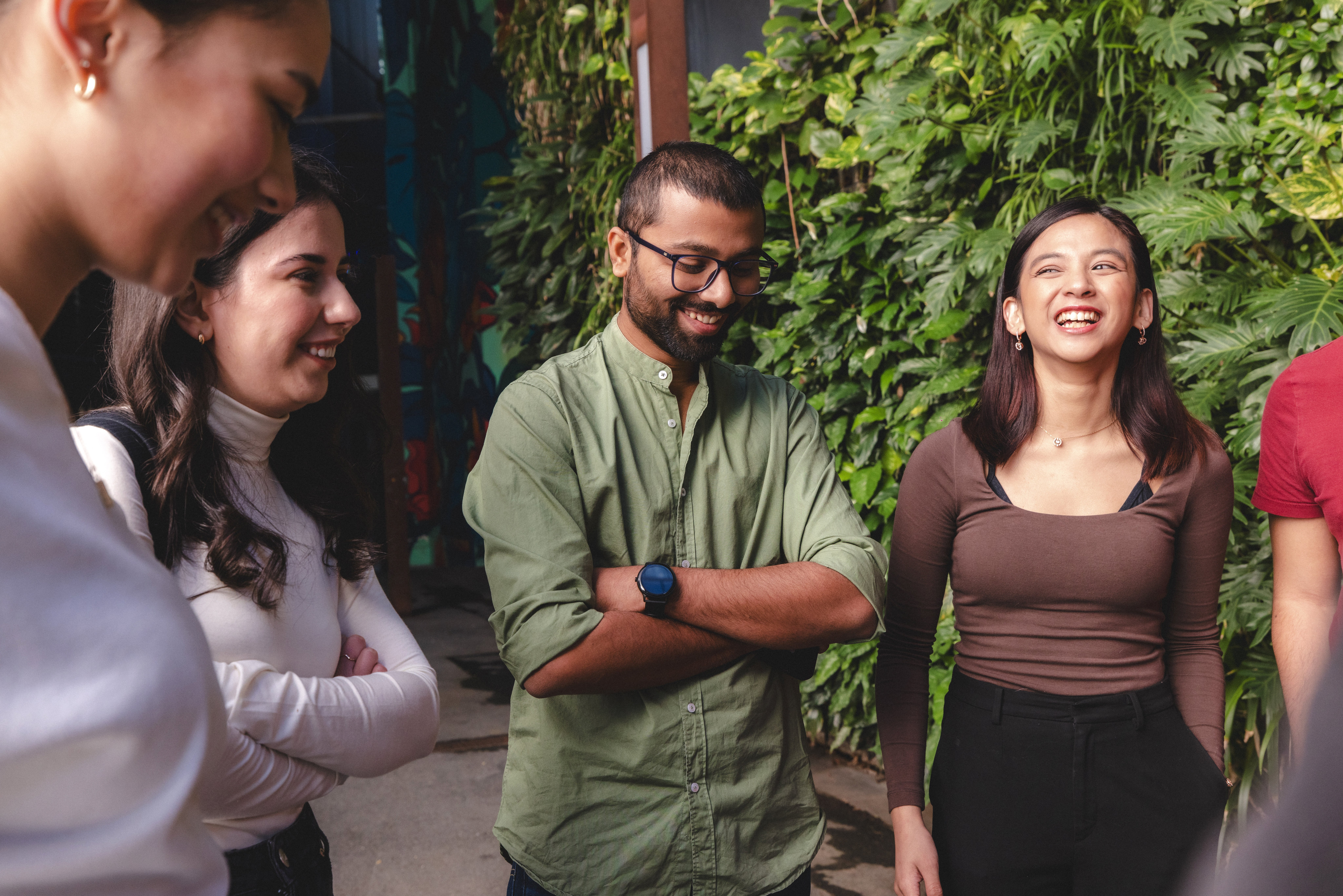 Students with a leafy background