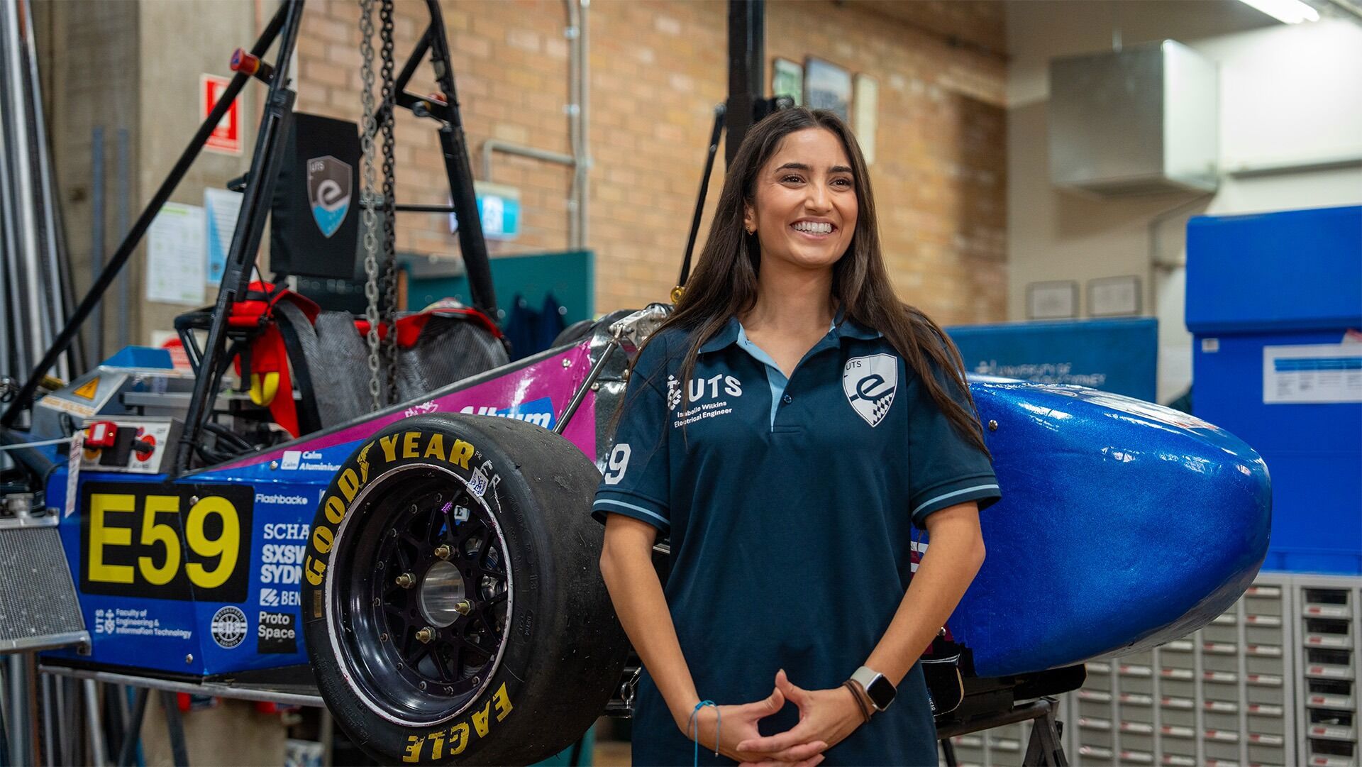 Female in front of car