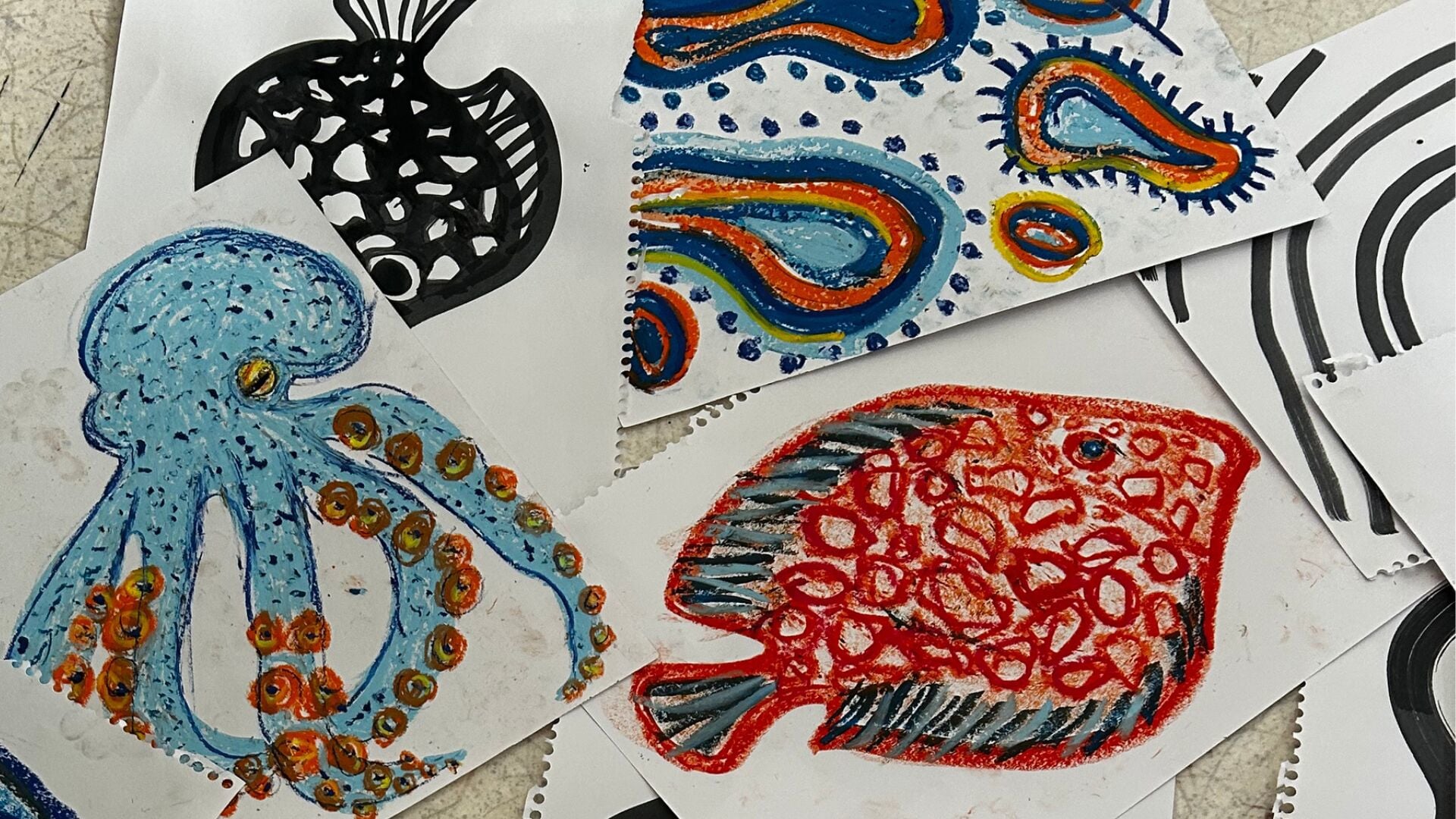 Sketches of colourful aquatic animals and plants, including an octopus and fish