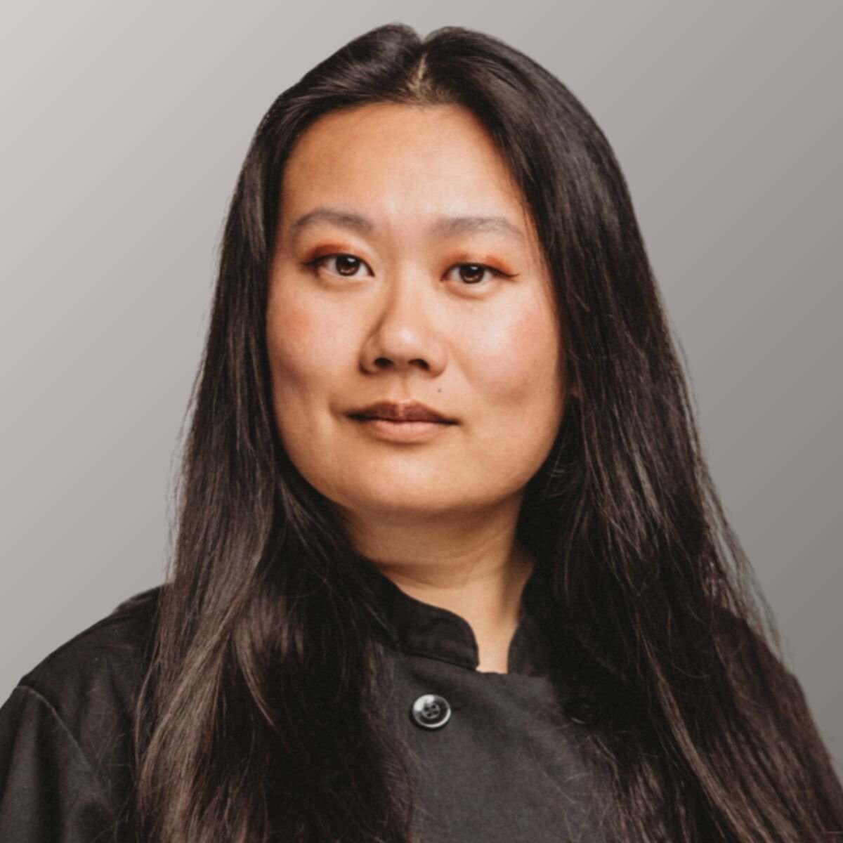 Portrait of Shuya Gong, she's wearing a black jacket.