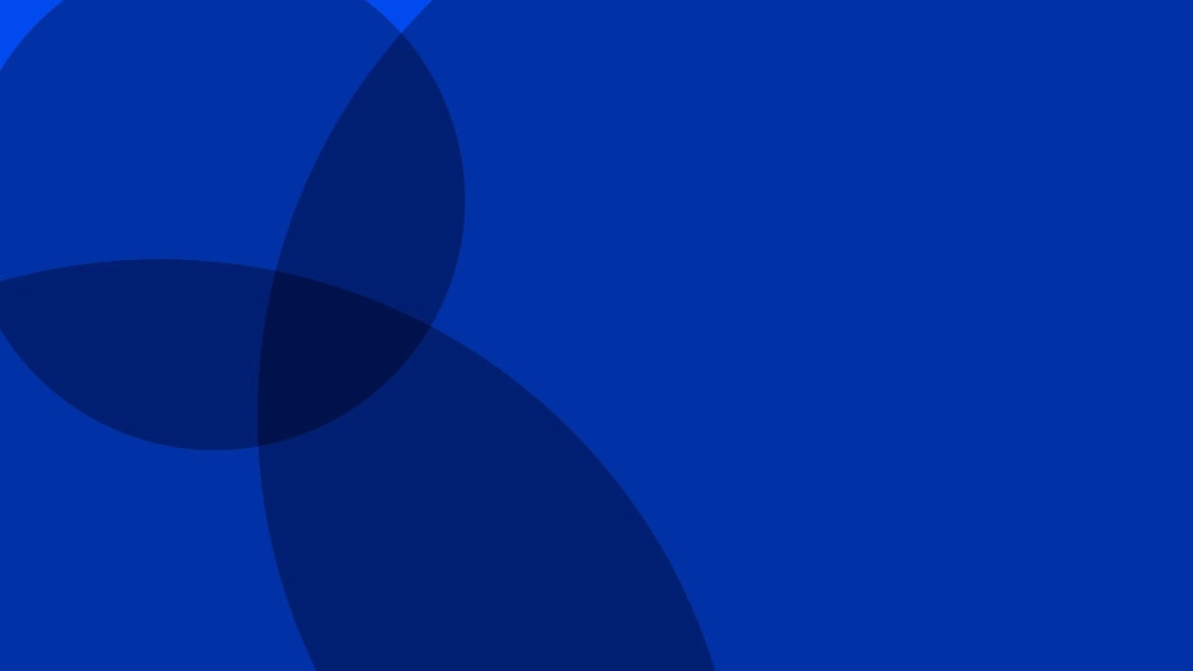A blue background featuring two overlapping circles in contrasting colors.