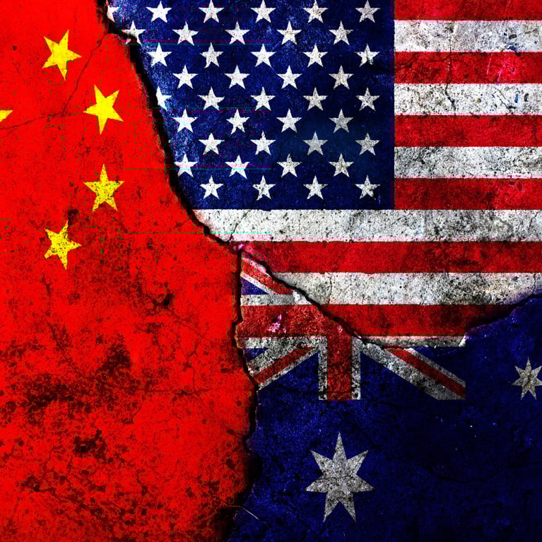Cracks in the wall. Graphic incorporating the flags of the USA, China and Australia. Picture by cil86/Adobe Stock