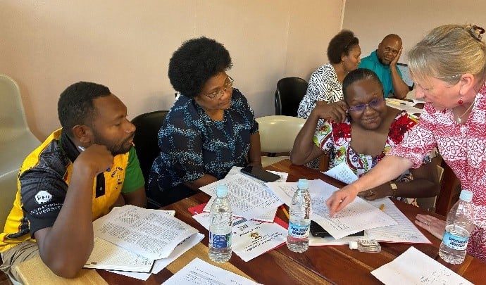 Dr Jan Forber with workshop participants / VCNE educators.