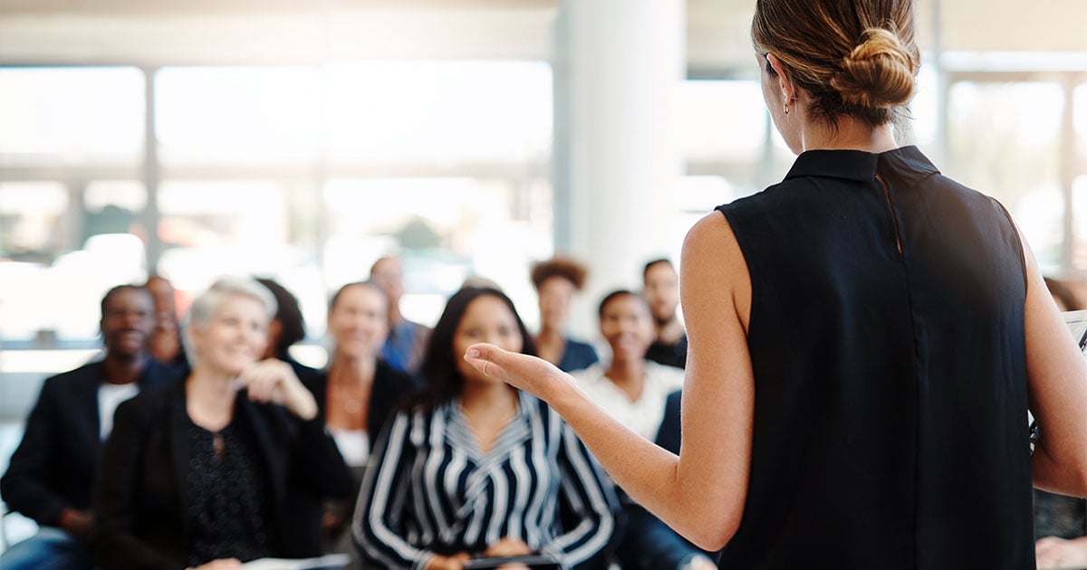 A lecturer addresses the comparative local government course
