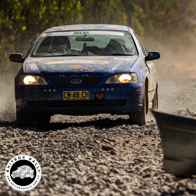 Shitbox Rally car driving through unsealed roads