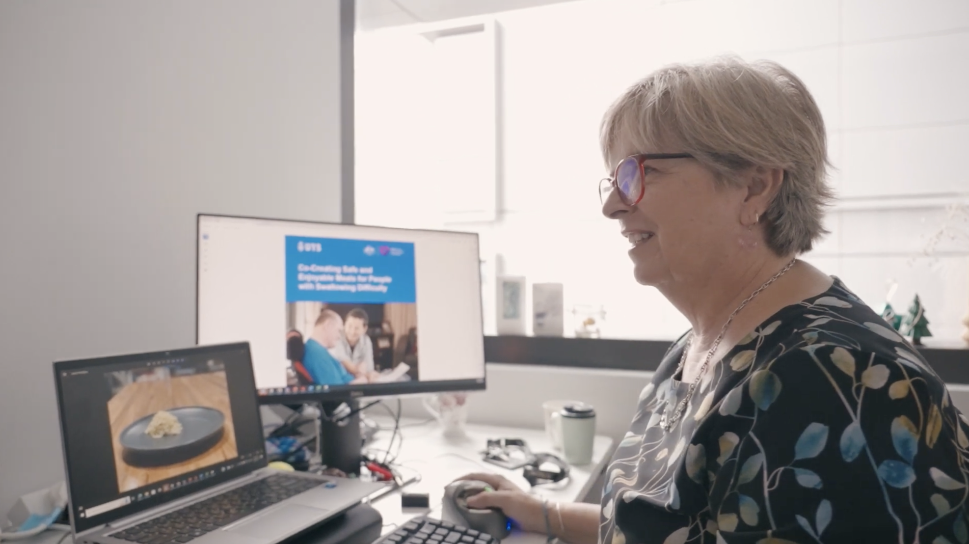 Bronwyn Hemsley sitting at a desk