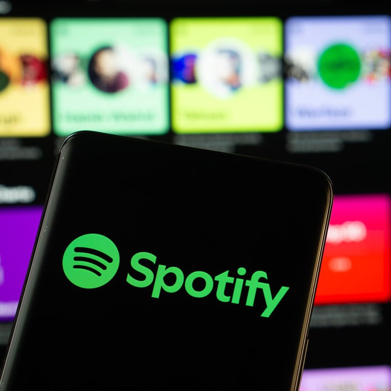 Dhaka, Bangladesh - 18 March 2025: The logo of the spotify is displayed on a smartphone screen, and the website spotify is visible on a smart phone screen. Picture: Mojahid Mottakin/Adobe Stock