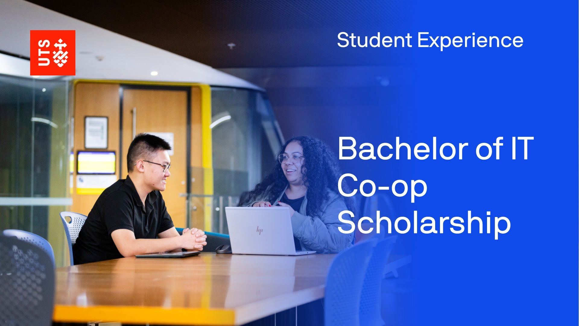 Bachelor of IT Co-op Scholarship students working on laptop