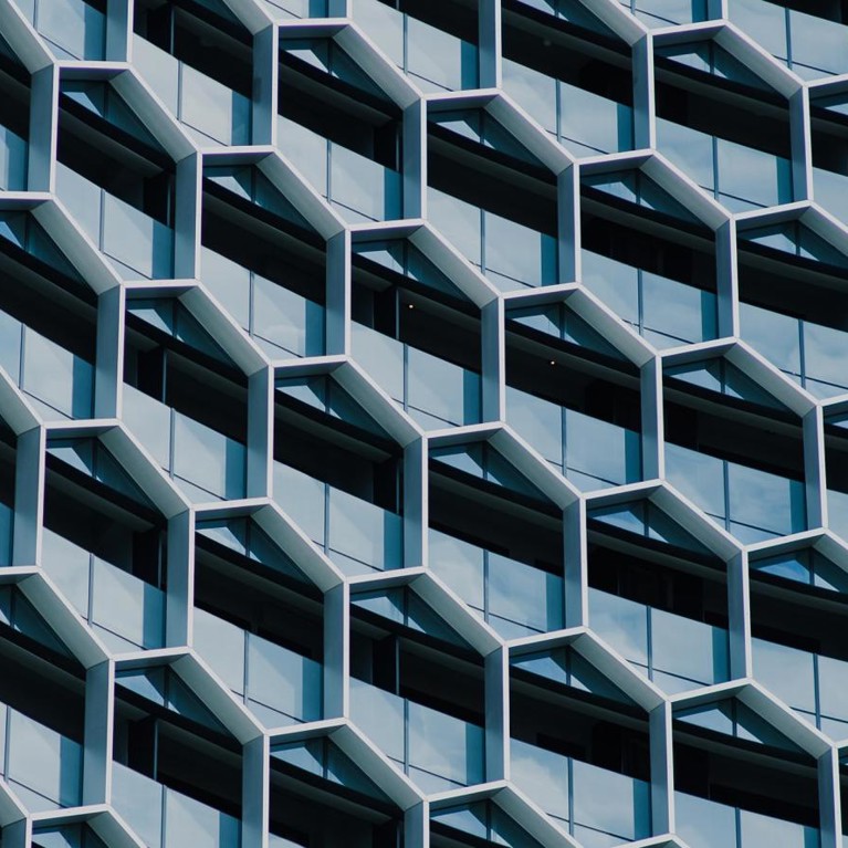 Detail of a building facade in a honeycomb