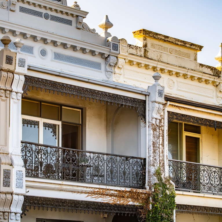 Victorian-era terrace houses with ornate cast-iron balconies in Australia showcase historic residential architecture and heritage design.
By Doublelee Adobe Stock