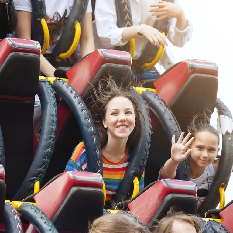 Young friends on roller coaster ride. Picture: olgasparrow/Adobe Stock