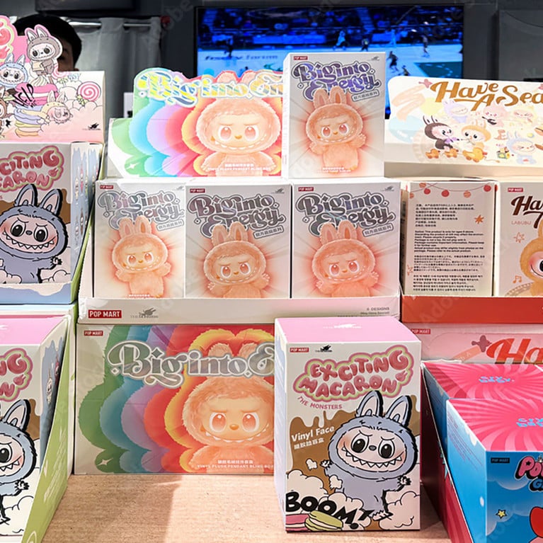 Pop Mart blind box toys including Labubu, Exciting Macaron, Biginto Pretty, Crybaby Powerpuff Girls on display in trendy toy store. By Ekaterina Elagina Adobe Stock
