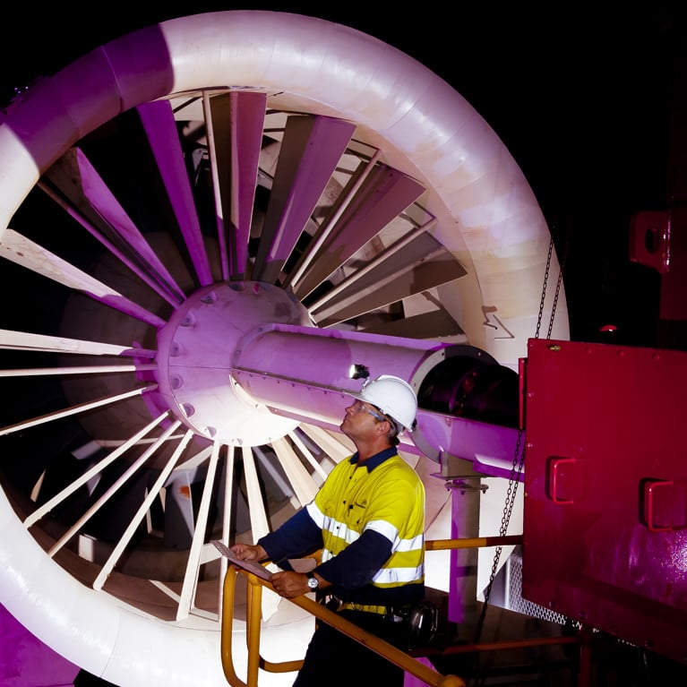 A technician operating a mine ventilation installation. Picture courtesy Howden.