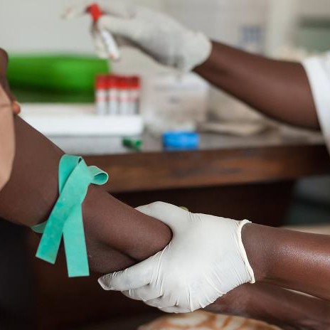 patient recieving injection in arm