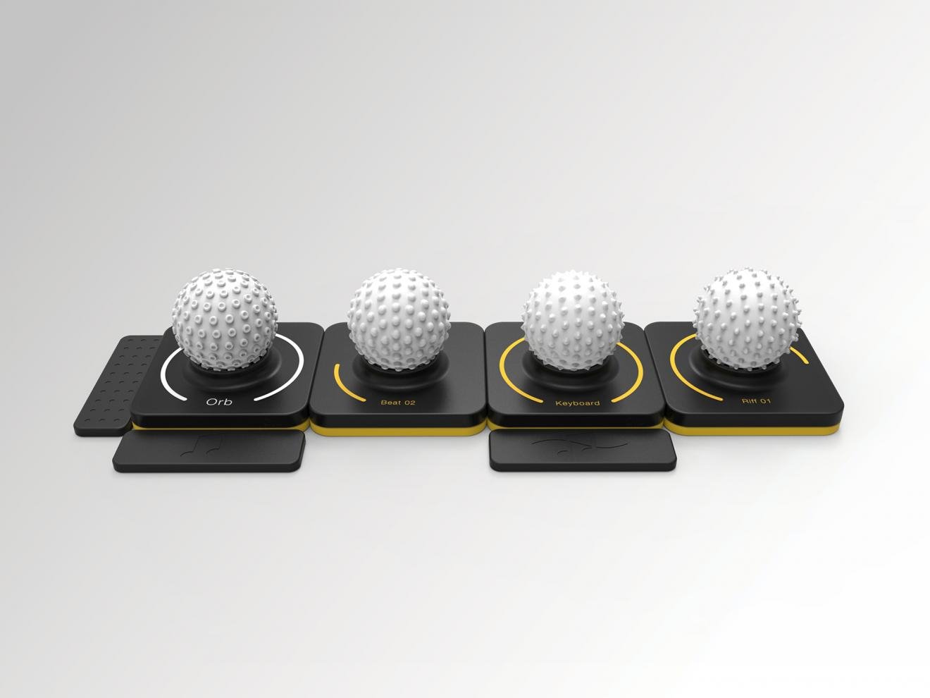Four white textured balls sit on black pads