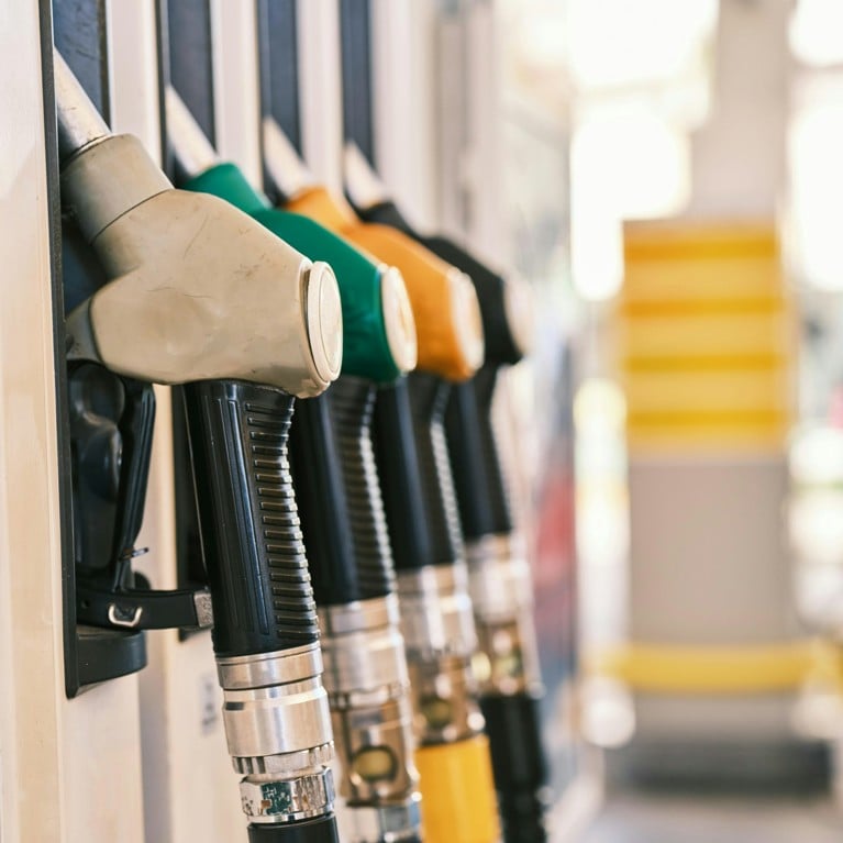 Close-up of a line of petrol pump nozzles. Picture: Engin Akyurt/Pexels, CC BY-NC-ND