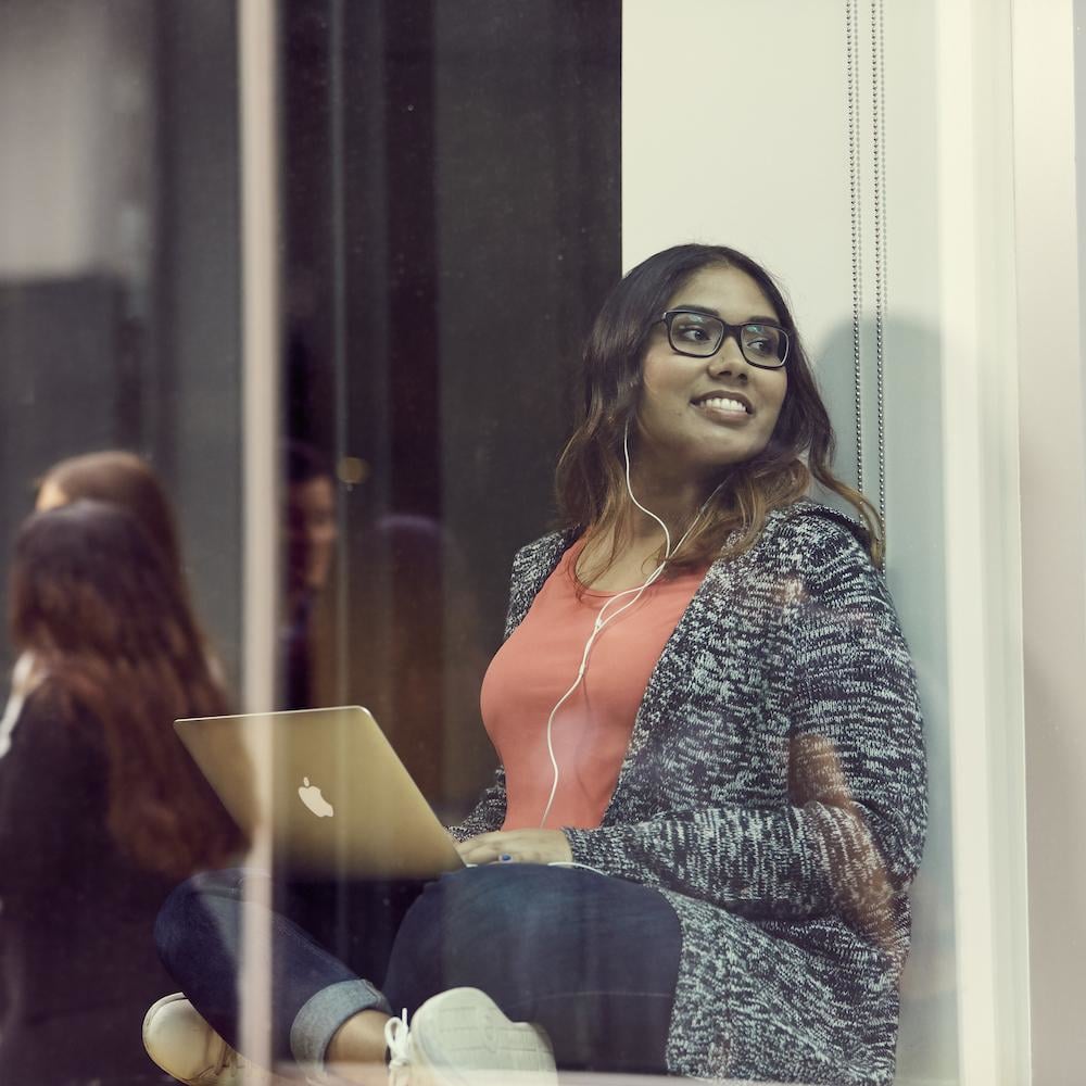 student looking out window