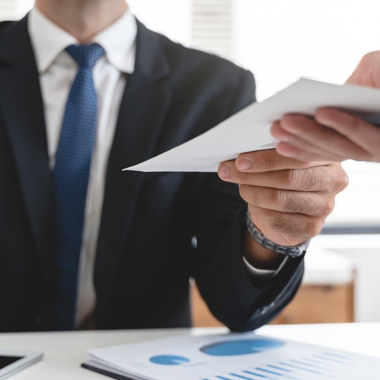 Close up view of office worker receiving bonus from boss.
By Pormezz Adobe Stock