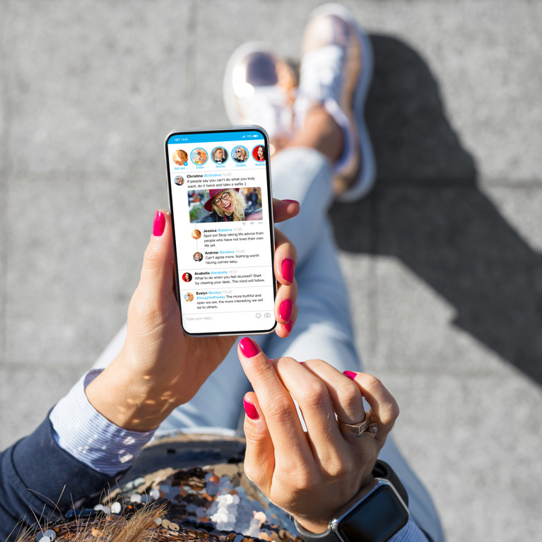 Woman using social media app on her phone
By Kaspars Grinvalds Adobe Stock