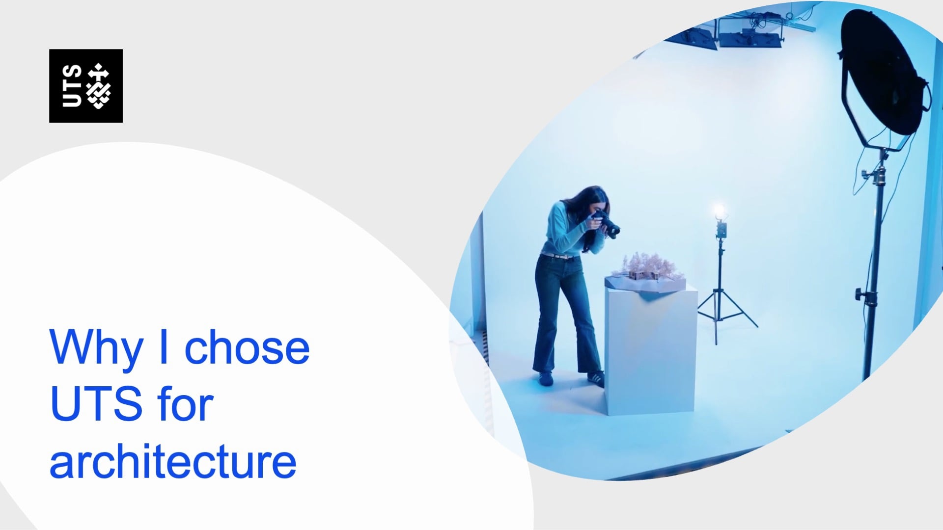 A student photographs a model in a blue-lit studio. The UTS logo is visible, with text reading "Why I chose UTS for architecture," conveying a professional tone.