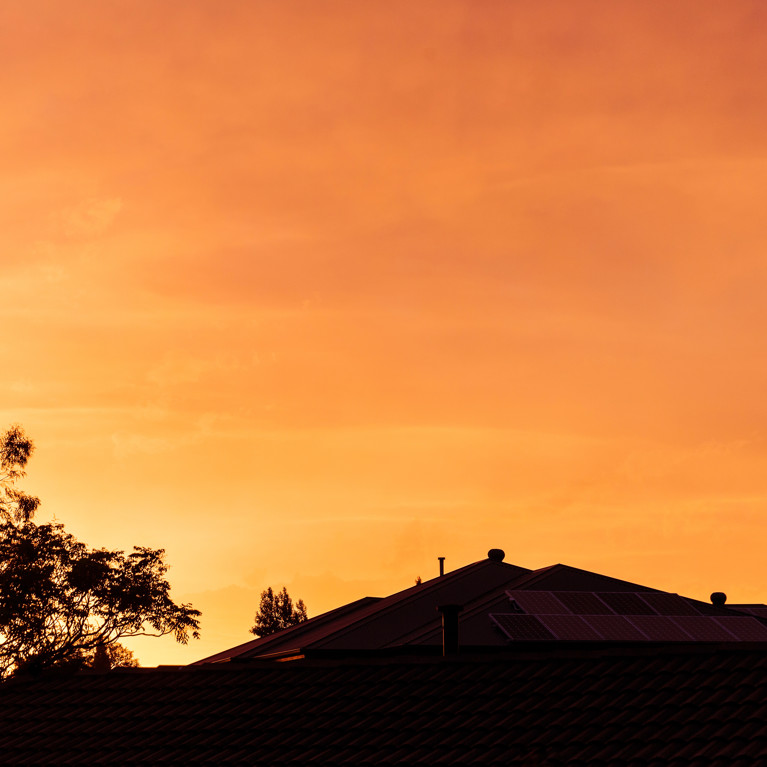 Orange sunset over Australian suburban scene during height of summer. Picture by timallenphoto/Adobe Stock