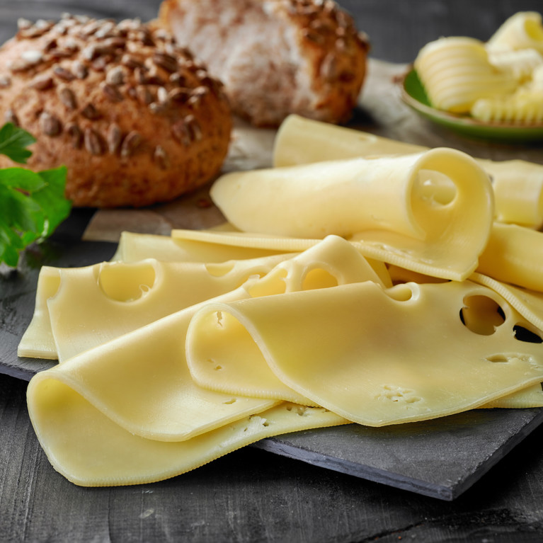 cheese slices and bread By Mara Zemgaliete Adobe Stock