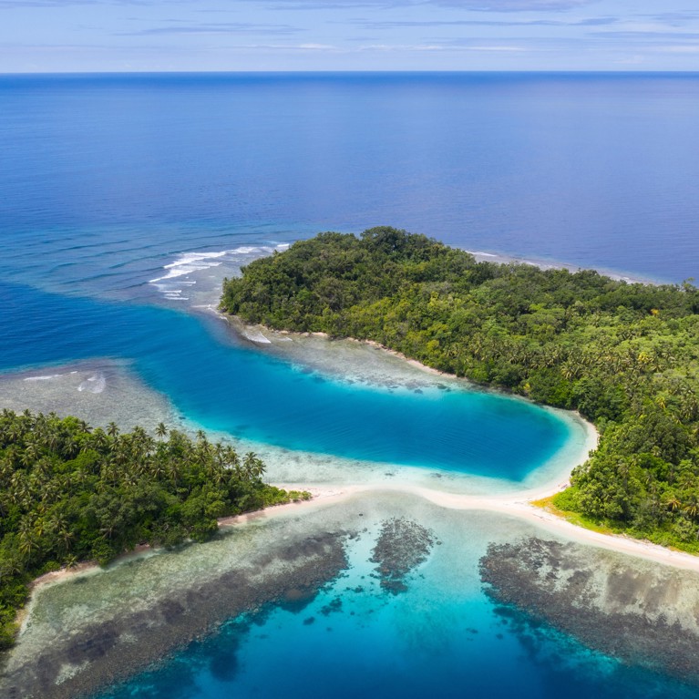 Aerial view of islands, reef and beach in Papua New Guinea
