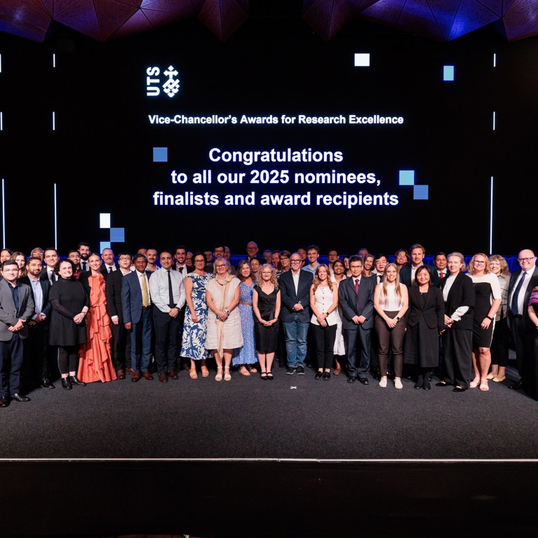 Group of winners on stage at the 2025 University of Technology Sydney Vice-Chancellor’s Awards for Research Excellence