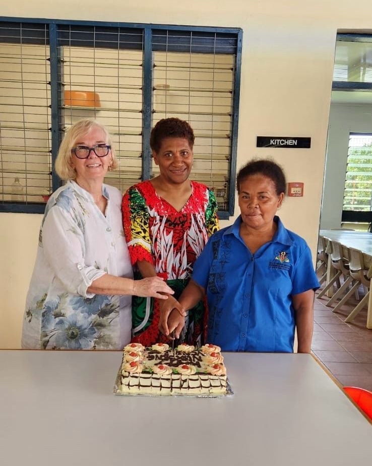 Prof. Di Brown with PNO Harriet Sam and VCNE Principal Evelyne Emile