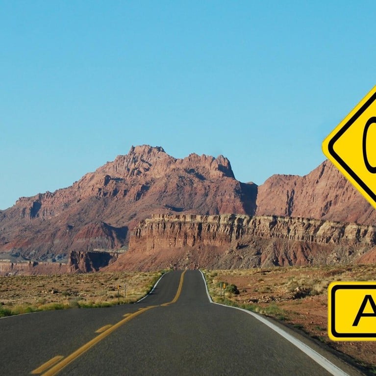 A road sign that says change ahead