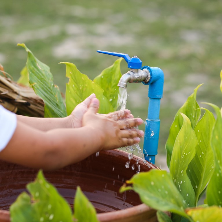 Child washing hands